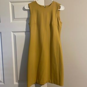 Above the knee, Calvin Klein mustard dress, size 2
Calvin Klein